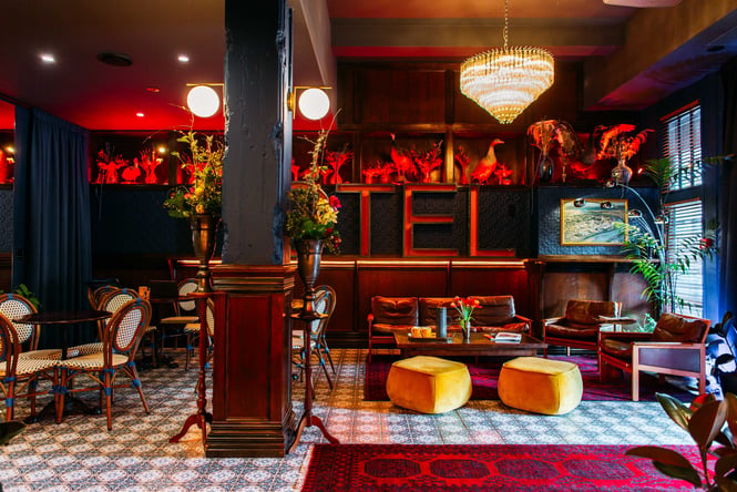 A seating area inside The Intrepid Hotel.