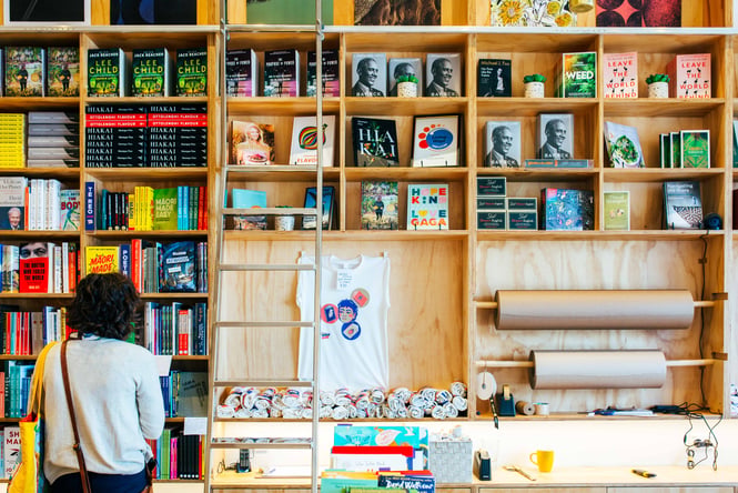 Books on display on shelves at Good Books.