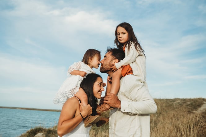 A family posing for a photo.