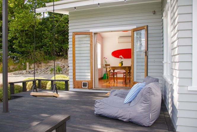 A porch with seating.