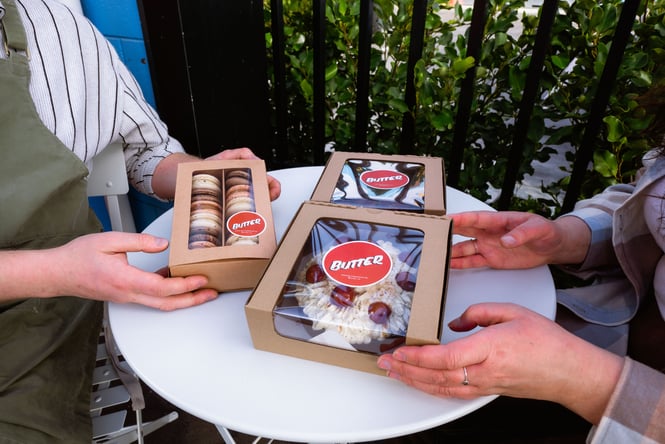 Three small boxes filled with petit fours and tarts from BUTTER in Christchurch