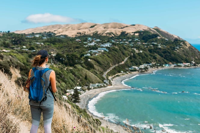 A woman walking The Paekākāriki Escarpment Track.