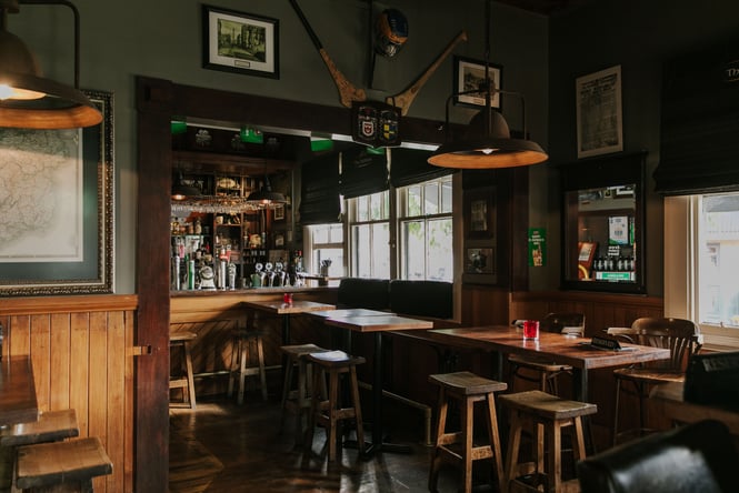 A dark Irish bar on a sunny day.