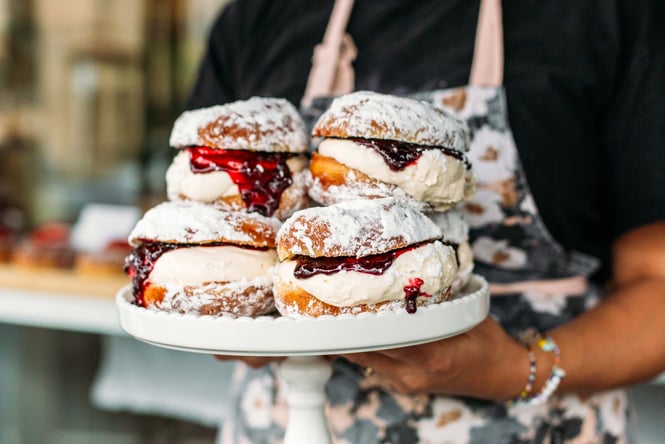 A close up of cream-filled pillows.