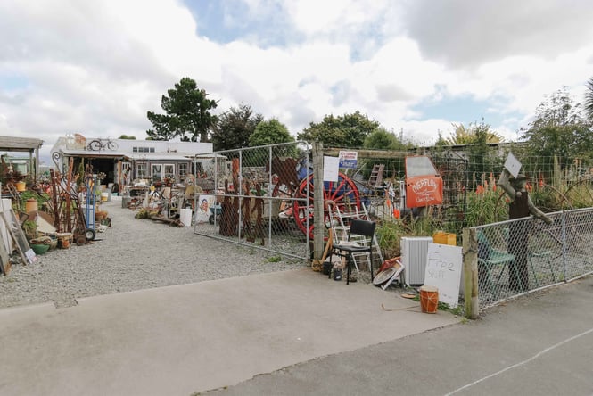 Second hand wares for sale in the front yard of Overflow Mayfield.