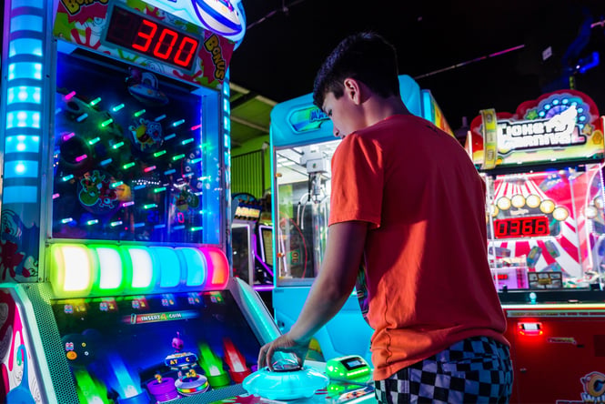 A man playing a game at Velocity Entertainment.
