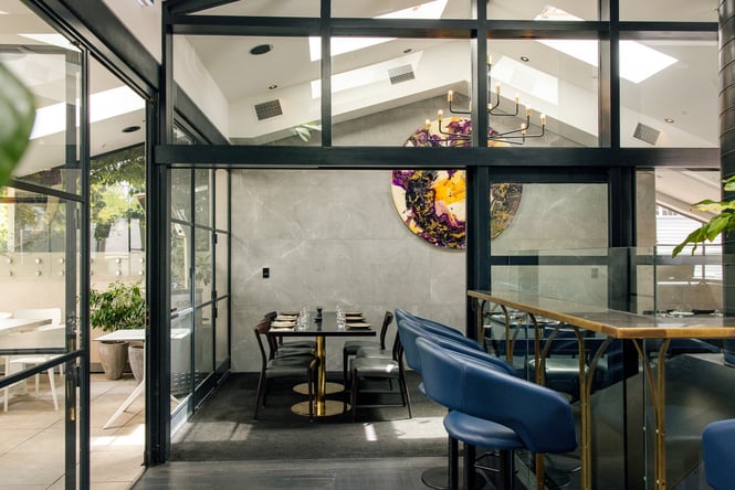 Glass walls inside a restaurant.
