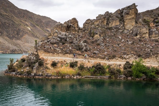 A bike track next to a lake.