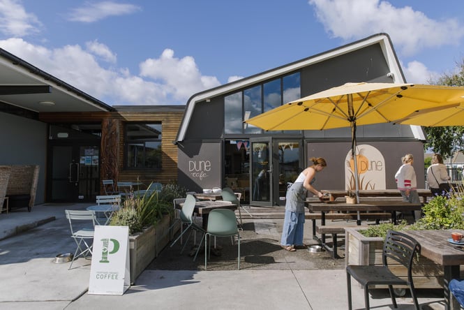 Street view of Dune Cafe in New Brighton on a sunny day
