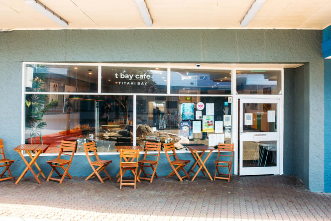 The blue and white entrance to T Bay cafe.
