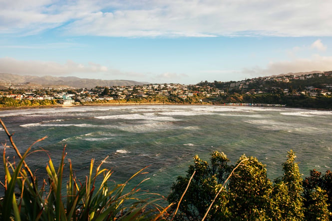 A view of Tītahi Bay at sunset.