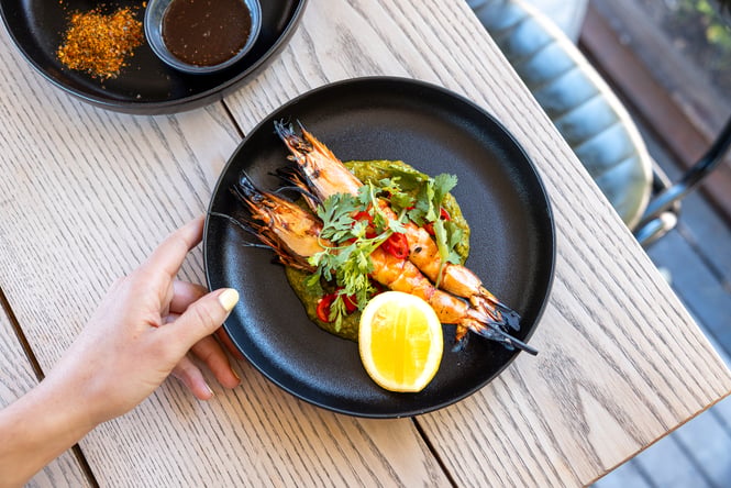 Plate of grilled prawn skewers at Tini in Akaroa