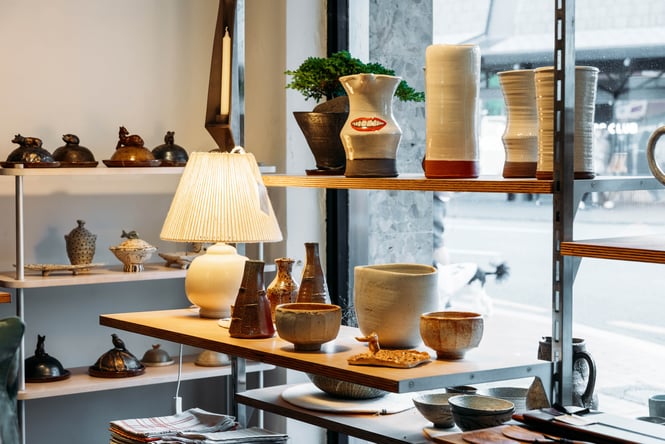 Vases on display on a table in retail store.