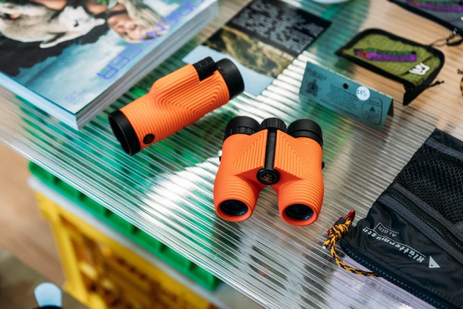 Close up of orange binoculars on display at Heatwave in Wanaka