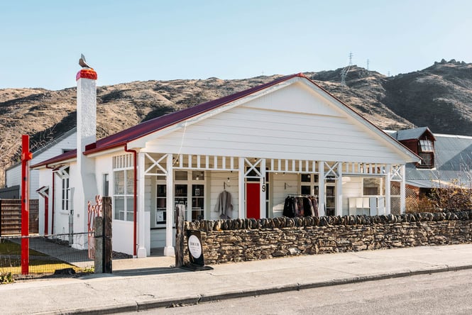 Red and white cottage exterior of Touch Yarns in Clyde