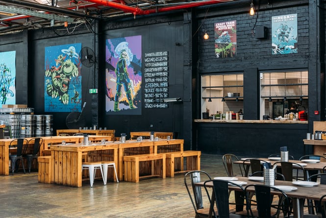 Tables and chairs inside Brewtown in Upper Hutt.