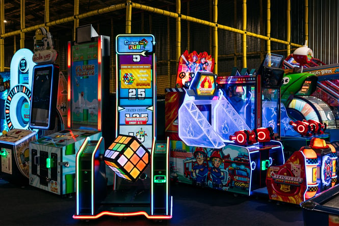 Arcade games lined up in a row.