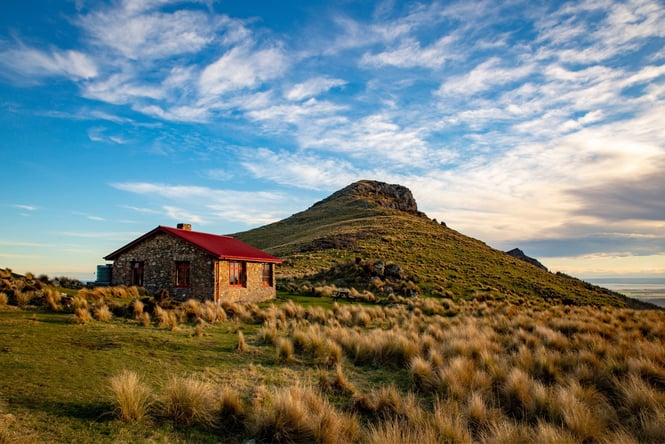 Packhorse Hut on a sunny day.