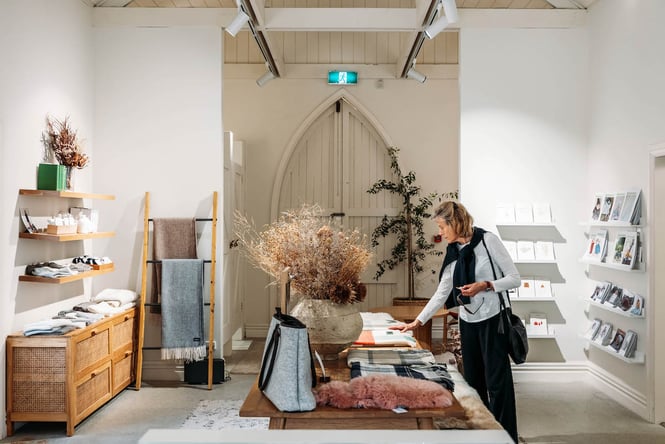 Interior of Perriam merino shop full of luxury woollen goods at Tarras Village