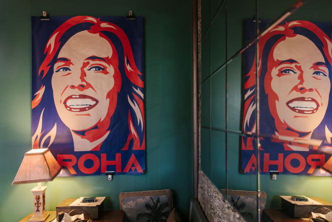A blue and red portrait of Jacinda Ardern.