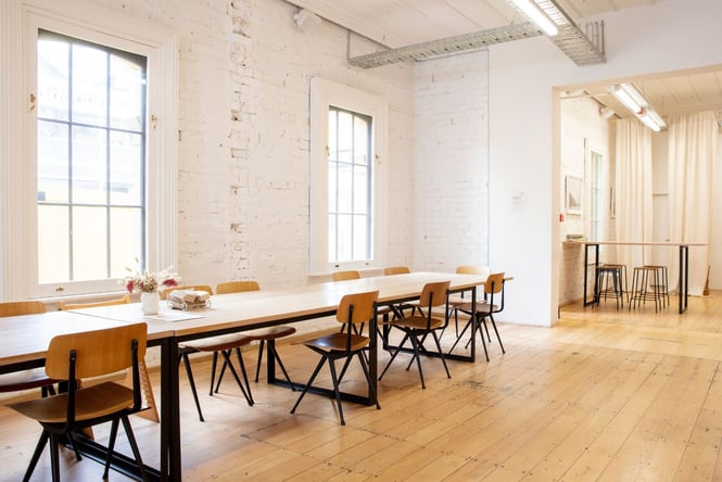 Tables and chairs inside of Daily Bread in Ponsonby.