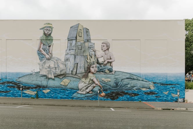 Ocean art on an exterior wall.