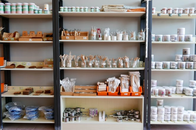 Pottery on display on shelves at The Clay Centre.
