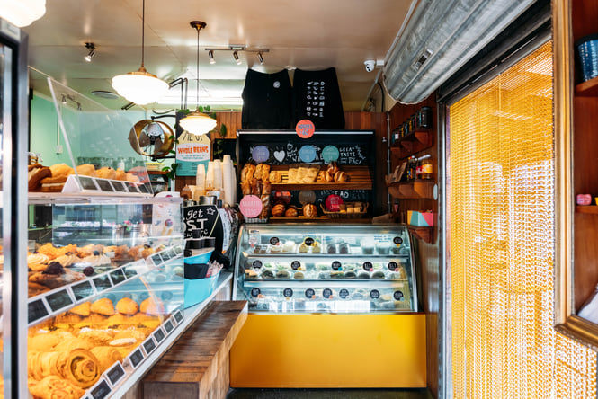 Cabinet full of food at Olde Beach Bakery.