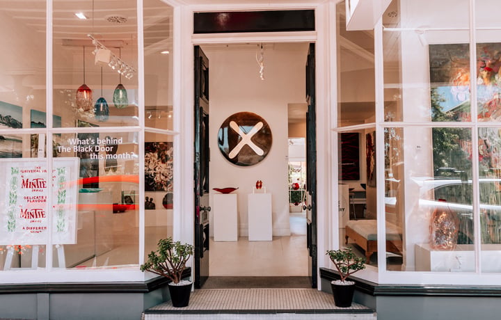 Looking through the open door of the Black Door Gallery in Parnell.