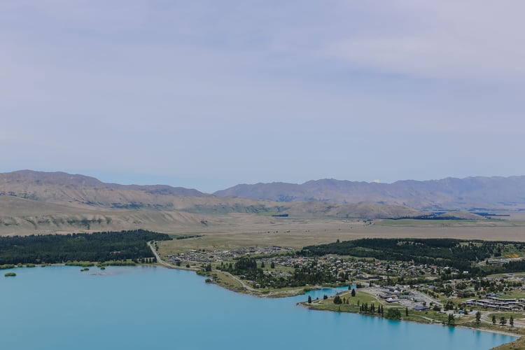 A lake and small township on a sunny day in South Canterbury.