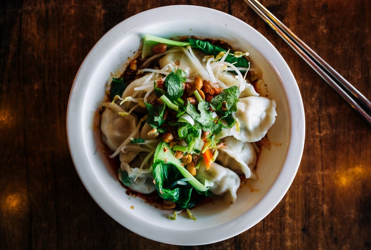Bowl of dumplings in broth from Chinese restaurant in Hamilton.