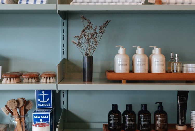 Homewares neatly displayed on shelves inside Everyday Needs in Auckland.