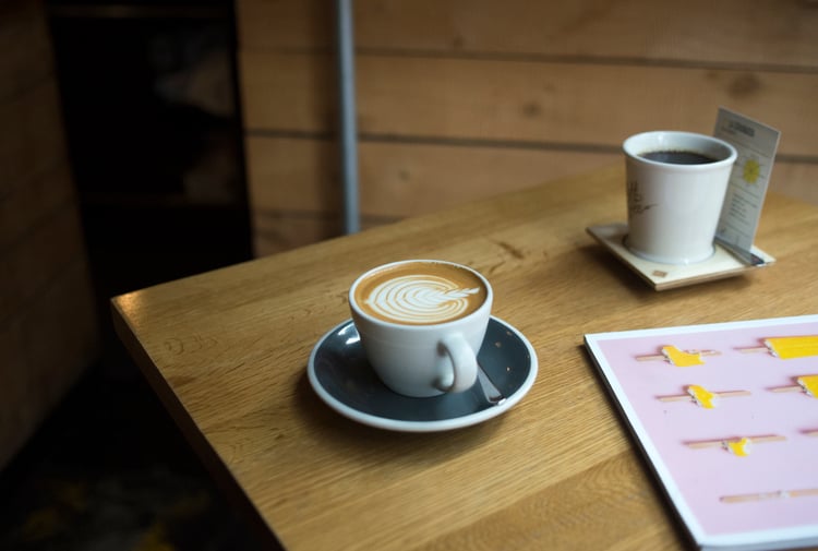 A coffee on a table.