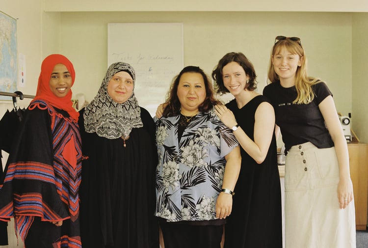 A photo of Elisha Watson with her team.