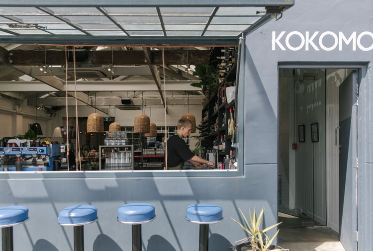 A large window looking into Kokomo cafe and restaurant in Christchurch.