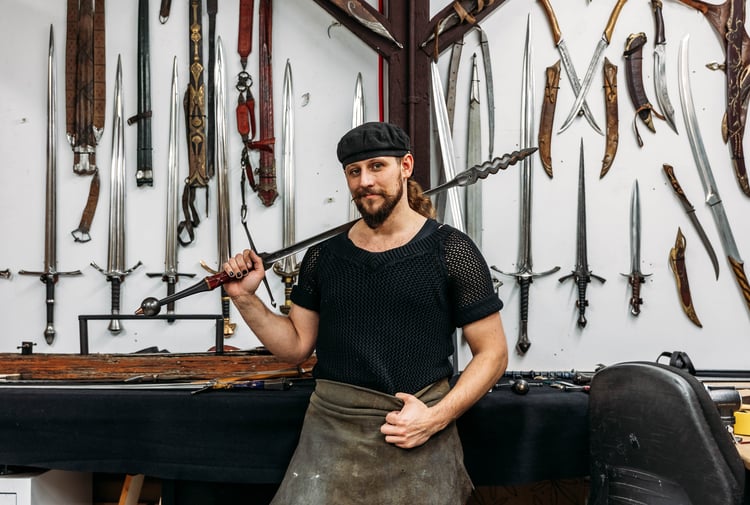 A man holding a sword.