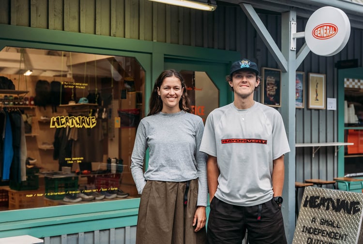 Portrait of Alice & Fionn outside Heatwave store in Wānaka
