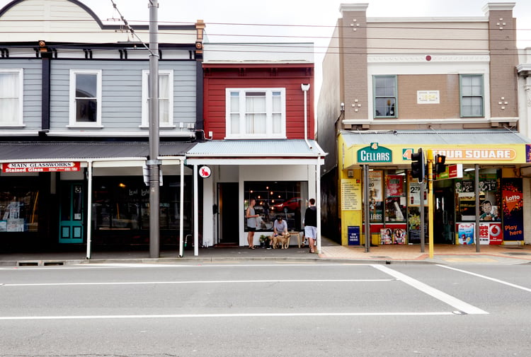 A view of shops from the other side of the street in Wellington's Newtown suburb.