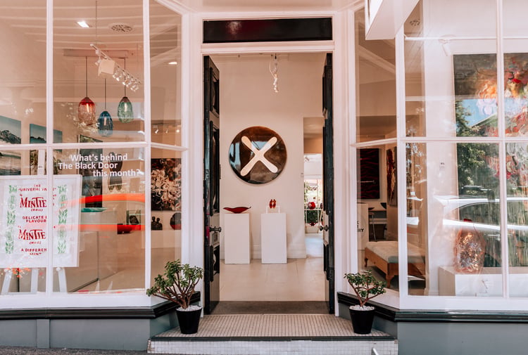 Looking through the open door of the Black Door Gallery in Parnell.