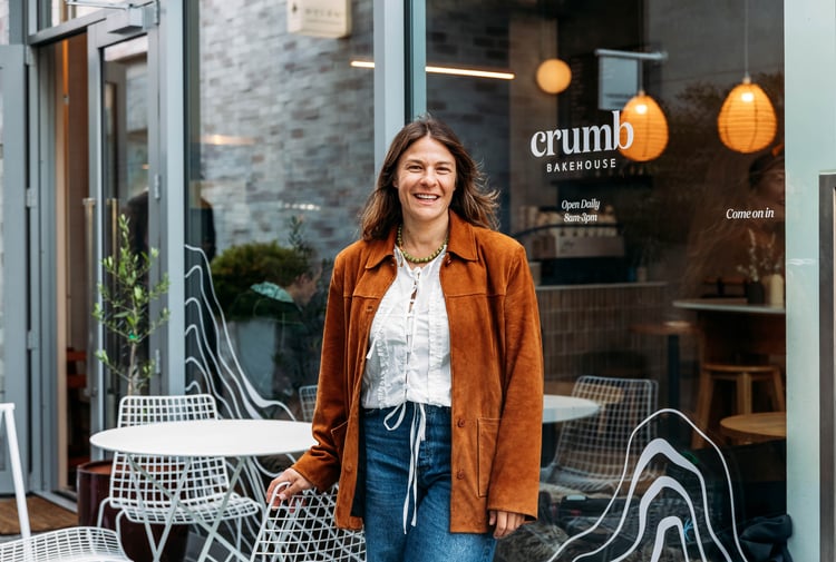 Lucy standing outside Crumb bakery.