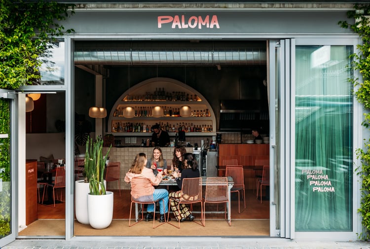 People sitting at a table at Paloma.