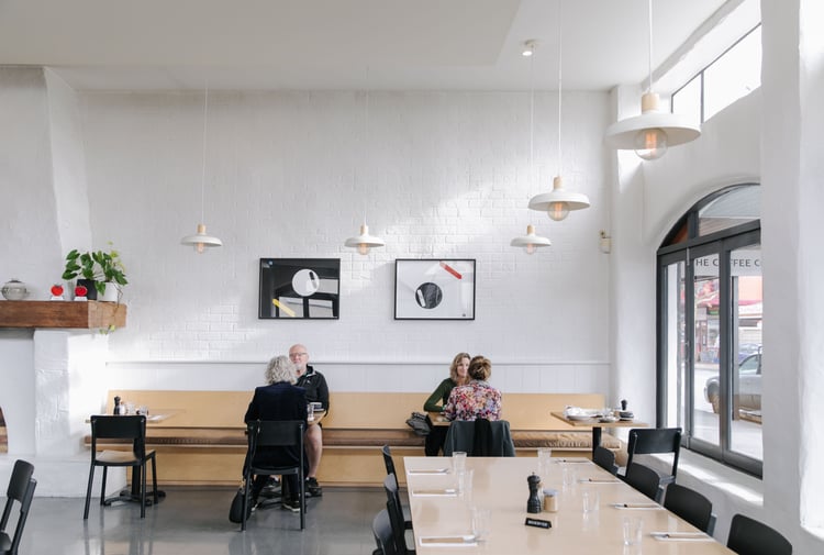 Customers dining inside Hardy St Eatery.