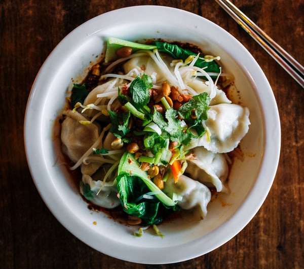Bowl of dumplings in broth from Chinese restaurant in Hamilton.