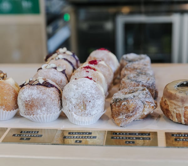 Row of donuts from Grizzly Baked Goods.