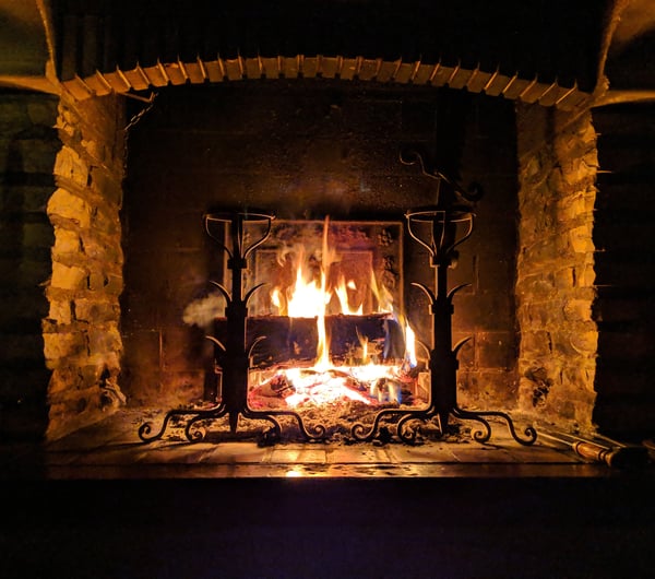 Roaring fire in fireplace by Stephane Juban.