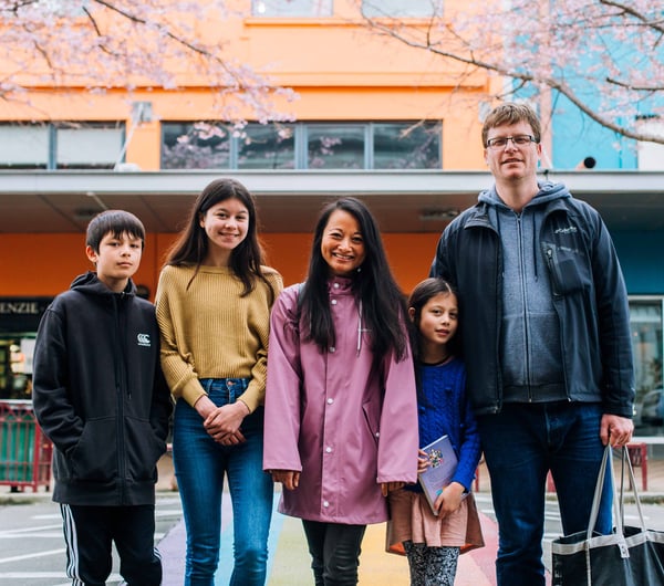 Mahalee and Benoit with their family on the streets of Palmerston North.