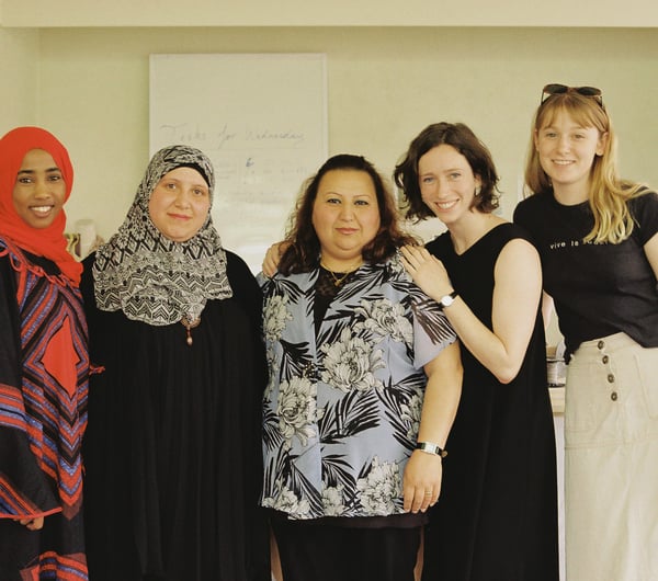 A photo of Elisha Watson with her team.