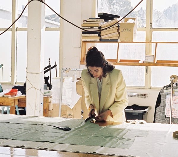 Rachel Mills at work cutting a pattern.