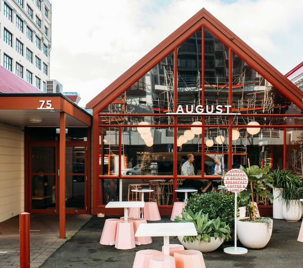 The red and glass exterior of August Eatery.