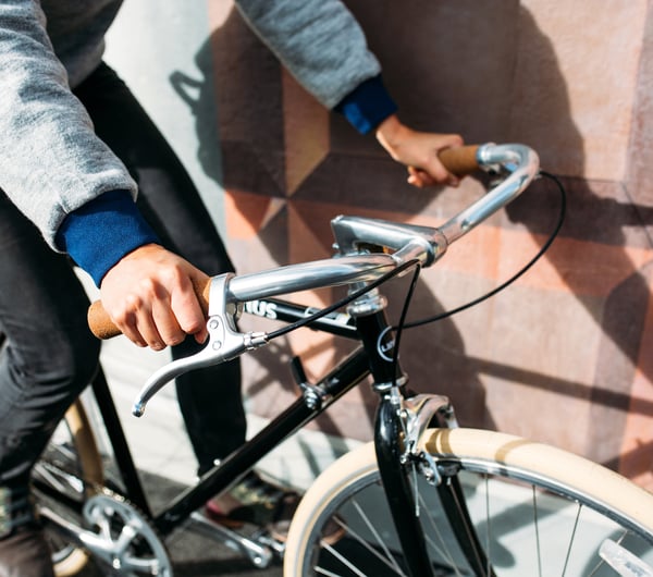 Close up of a woman on a bike.
